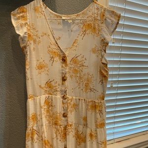 A very cute Summer dress. Size M but fit me of size S.